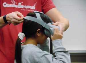 young girl using a VR headset